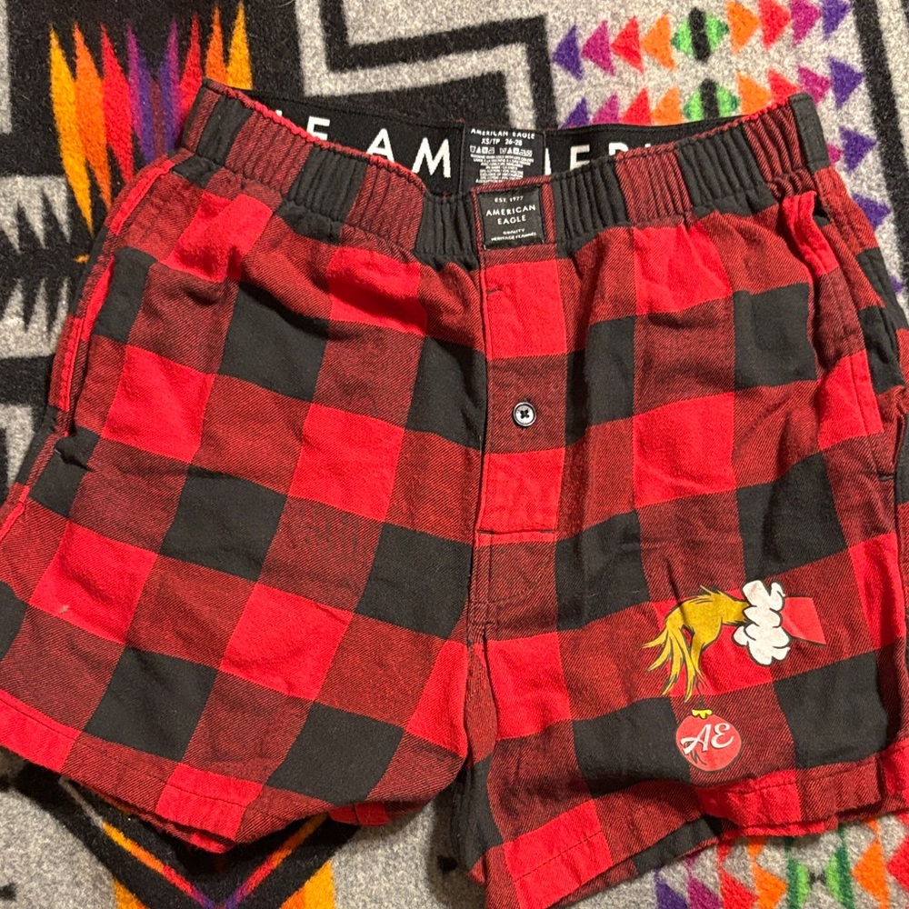 American Eagle Outfitters Red and Black Plaid Grinch Shorts Christmas